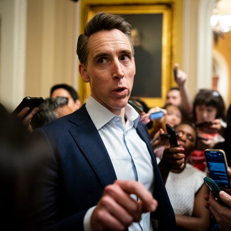 Sen. Josh Hawley, R-Missouri, speaks with reporters while arriving for a meeting with Senate Republicans in the U.S. Capitol on June 28, 2025 in Washington, DC.