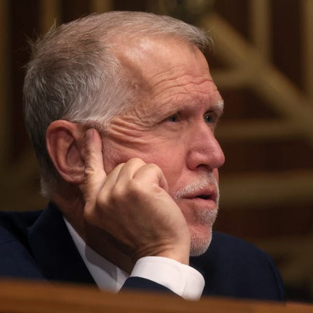 U.S. Sen. Thom Tillis (R-NC) listens as U.S. Consumer Financial Protection Bureau (CFPB) Director Rohit Chopra testifies before a Senate Banking, Housing and Urban Affairs Committee hearing on "the Consumer Financial Protection Bureau's Semi-Annual Report to Congress" on the Hill in Washington, U.S., June 13, 2023. REUTERS/Leah Millis