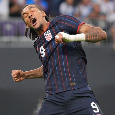 United States of America forward Damion Downs (9) celebrates after defeating Costa Rica in a shoot out during a quarterfinal match of the 2025 Gold Cup at U.S. Bank Stadium.