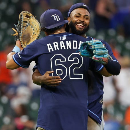 Junior Caminero and Jonathan Aranda celebrating a win.