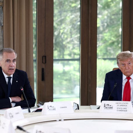 President Donald Trump and Canadian Prime Minister Mark Carney attend a meeting with G7 leaders and guests, at the G7 summit in Kananaskis, Alberta, Canada, June 16, 2025.