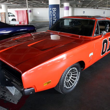 The "Dukes of Hazzard" General Lee car is displayed at the Barris Star Car Collection Auction at the Petersen Automotive Museum on May 13, 2005, in Los Angeles.