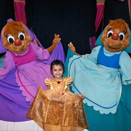 Lilly Fernandez dressed up as Belle during Walt Disney World during Disney Week of Wishes. Ariel and Belle are her favorites.