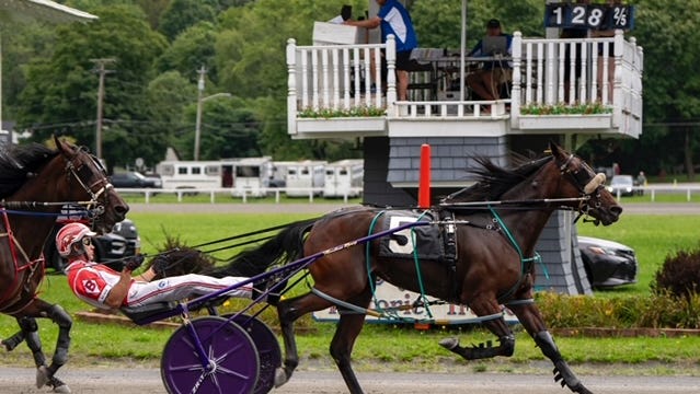 Harness racing at the annual Grand Circuit Races at Goshen Historic Track.