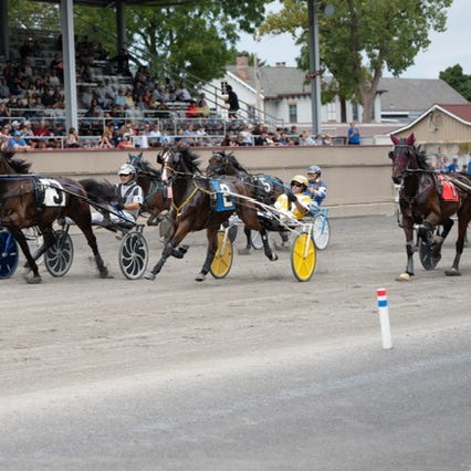 Harness racing at the annual Grand Circuit Races at Goshen Historic Track.