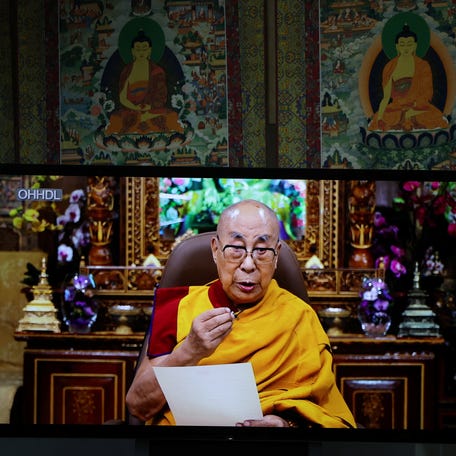 Tibetan spiritual leader Dalai Lama addresses via a video message at the inaugural session at the 15th Tibetan Religious Conference at the Dalai Lama Library and Archive near Tsuglagkhang, also known as Dalai Lama's Temple complex, in the northern hill town of Dharamshala, India, July 2, 2025.