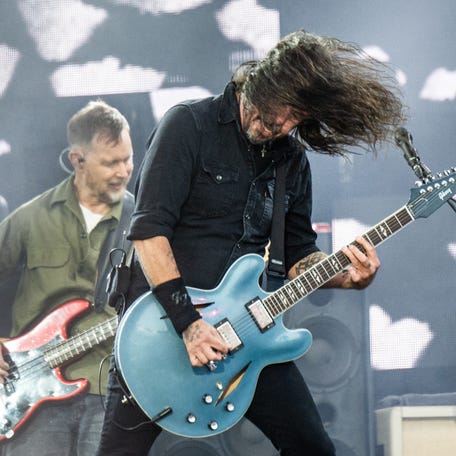 Dave Grohl of rock band Foo Fighters performs on the Orange Stage at Roskilde Festival on July 5, 2024, in Roskilde, Denmark.