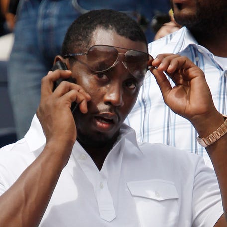 Sean 'Diddy' Combs attends the match between Roger Federer of Switzerland and Novak Djokovic of Serbia during day 13 of the 2011 U.S. Open at the USTA Billie Jean King National Tennis Center on Sept. 10, 2011, in the Queens borough of New York City.