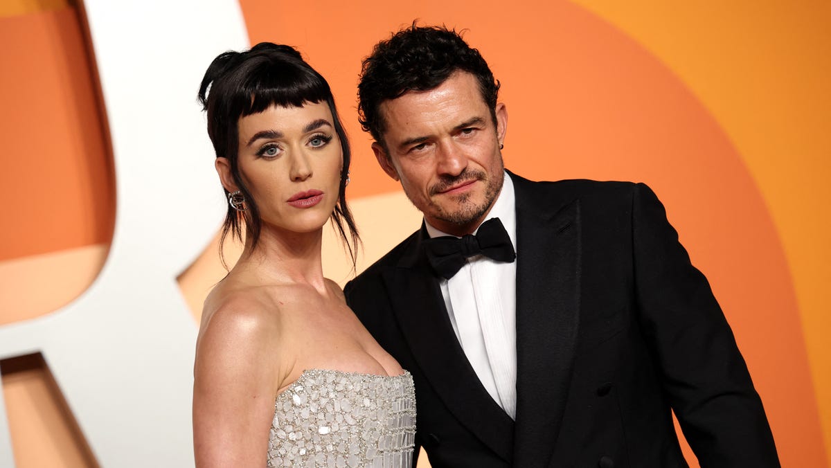 Katy Perry, left, and Orlando Bloom attend the Vanity Fair Oscar Party at the Wallis Annenberg Center for the Performing Arts in Beverly Hills, California, on March 2, 2025