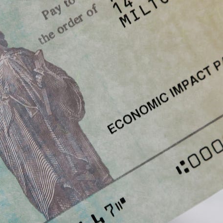 A family's stimulus check from the U.S. Treasury for the coronavirus disease (COVID-19) aid arrived in the mail in Milton, Massachusetts, U.S., March 25, 2021.