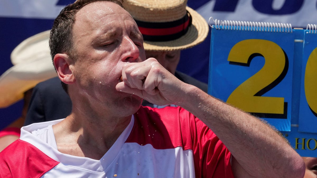 Joey Chestnut, a multi-time winner, competes during the 2025 Nathan's Famous International Hot Dog Eating Contest, at Coney Island, Brooklyn in New York City, U.S., July 4, 2025. REUTERS/David 'Dee' Delgado