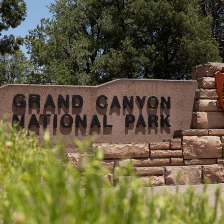 The Grand Canyon National Park welcome sign is seen from a view near Tusayan, Arizona, June 28, 2025.