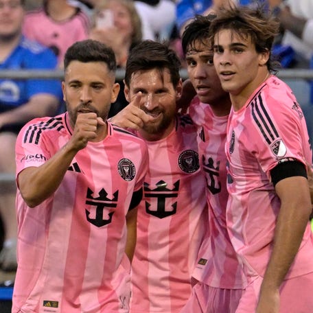 Inter Miami's Lionel Messi (10) celebrates after scoring a goal against CF Montreal during the first half at Saputo Stadium.