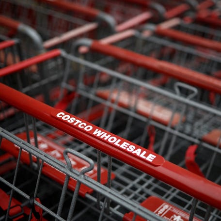 Shopping carts await customers at a Costco store in Arlington, Virginia, ahead of Black Friday 2024. REUTERS/Benoit Tessier