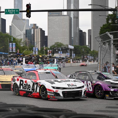 NASCAR Cup Series driver Ricky Stenhouse Jr. (47) and Alex Bowman (48) drive during the Grant Park 165 at Chicago Street Race.