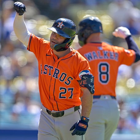 Jose Altuve celebrates against the Dodgers.