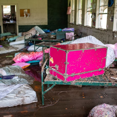 Items lie scattered inside a cabin at Camp Mystic after deadly flooding in Kerr County, Texas, U.S., July 5, 2025. REUTERS/Sergio Flores