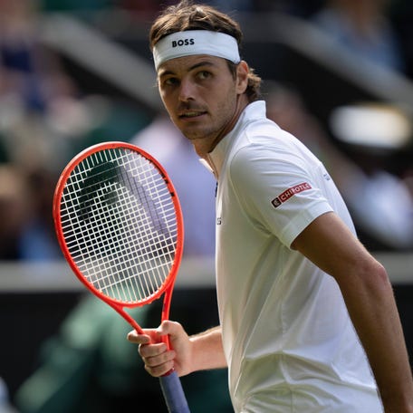 Taylor Fritz reacts to a point during his match against Alejandro Davidovich Fokina at Wimbledon on July 4, 2025.