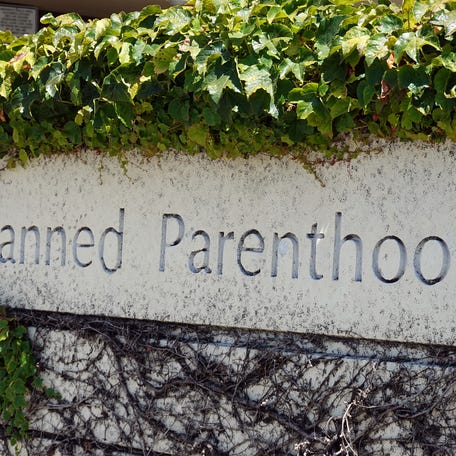 SAN RAFAEL, CALIFORNIA - JUNE 26: A sign is posted in front of a Planned Parenthood health center on June 26, 2025 in San Rafael, California. A Supreme Court ruling will allow states to cut Medicaid funds to reproductive health provider Planned Parenthood, which will disqualify Medicaid patients from obtaining health care services from Planned Parenthood providers if the funding has been cut by the state. (Photo by Justin Sullivan/Getty Images)
