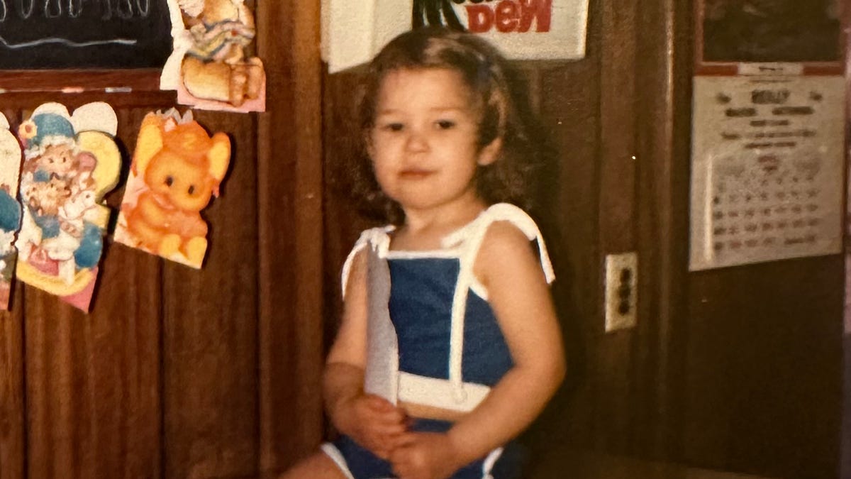 Rosalee sits on top of the counter at the diner on their second birthday.