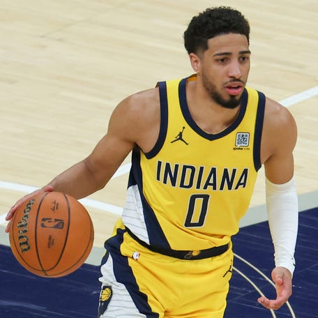 Indiana Pacers guard Tyrese Haliburton dribbles the ball against the Oklahoma City Thunder in the second quarter during game six of the 2025 NBA Finals at Gainbridge Fieldhouse.