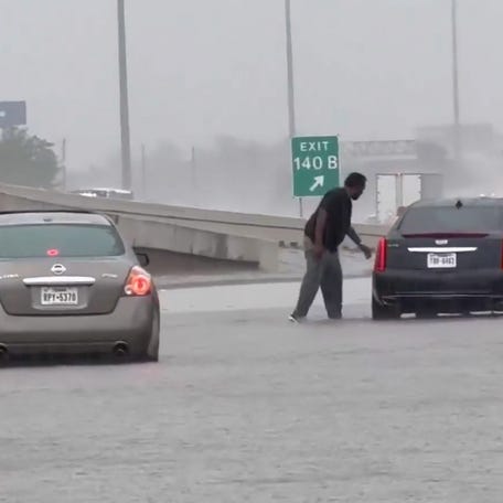 Heavy downpours flood streets in the Houston area