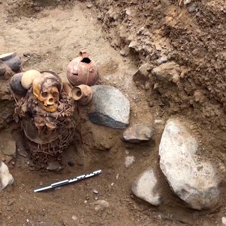The 1,000-year-old mummified remains of a woman were discovered in Peru as workers installed natural gas pipelines.