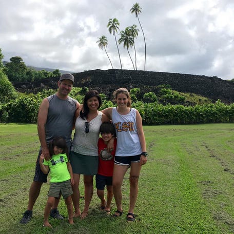 Sara Goo and her family at the Piilanihale Heiau, part of her ancestral lands.