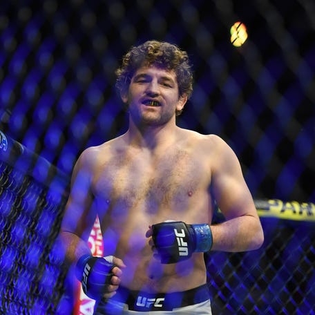 Robbie Lawler (red gloves) and Ben Askren (blue gloves) during UFC 235 at T-Mobile Arena in Las Vegas on March 2, 2019.