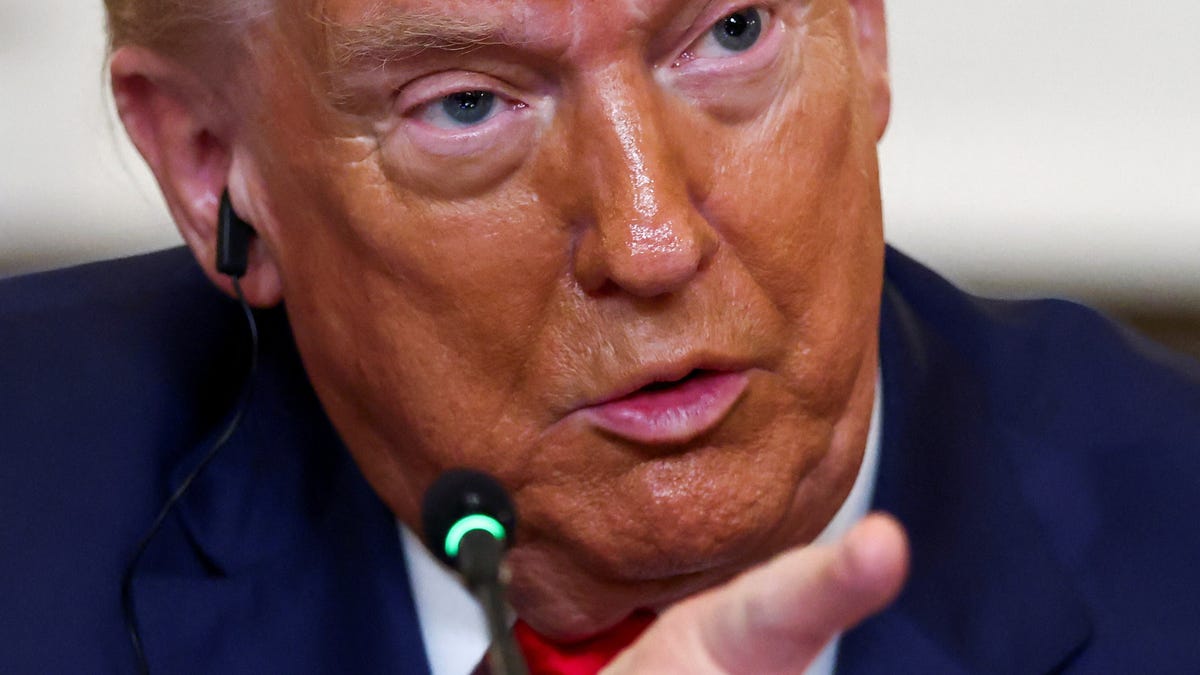 U.S. President Donald Trump gestures, as he hosts a lunch for African leaders of Gabon, Guinea-Bissau, Liberia, Mauritania, and Senegal in the State Dining Room at the White House in Washington, D.C., U.S., July 9, 2025.