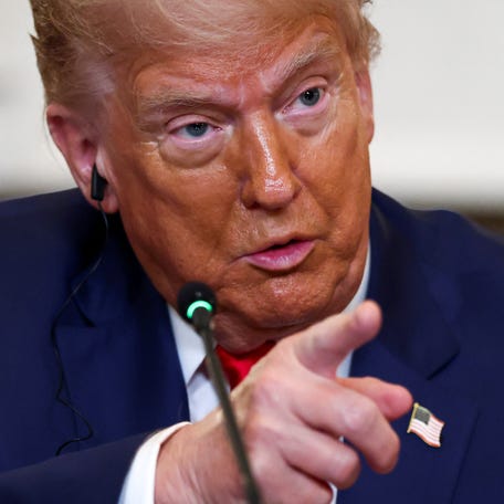U.S. President Donald Trump gestures, as he hosts a lunch for African leaders of Gabon, Guinea-Bissau, Liberia, Mauritania, and Senegal in the State Dining Room at the White House in Washington, D.C., U.S., July 9, 2025.