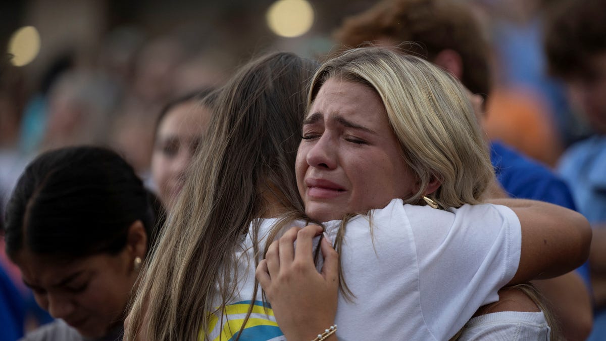 People attend a prayer service for flood victims in Kerrville, Texas on July 9, 2025.