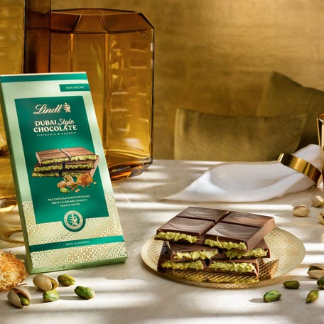 Lindt USA unveiled its Dubai Style Chocolate Bar in major retailers on July 7, 2025. The bar contains milk chocolate and a pistachio paste containing 45% pistachios, kadayif, almonds and hazelnuts