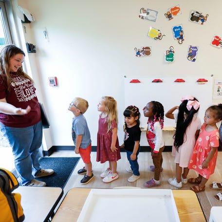 Lead Teacher Kayla Talbert has students line up to go outside to the playground in classroom for 3- to 5-year-olds at an OACAC Head Start on Tuesday, June 17, 2025.