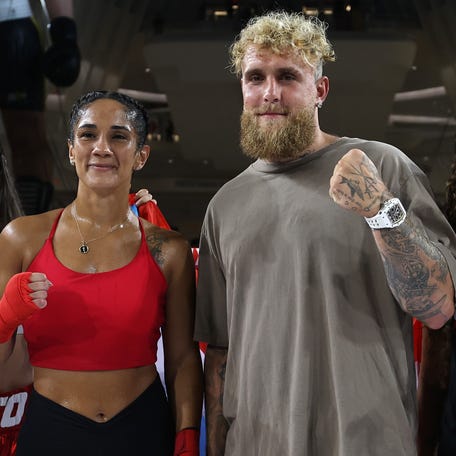 Amanda Serrano and Jake Paul attend the Open Workout at The Oculus at Westfield World Trade Center ahead of Netflix's Katie Taylor vs Amanda Serrano 3 fight on July 11.