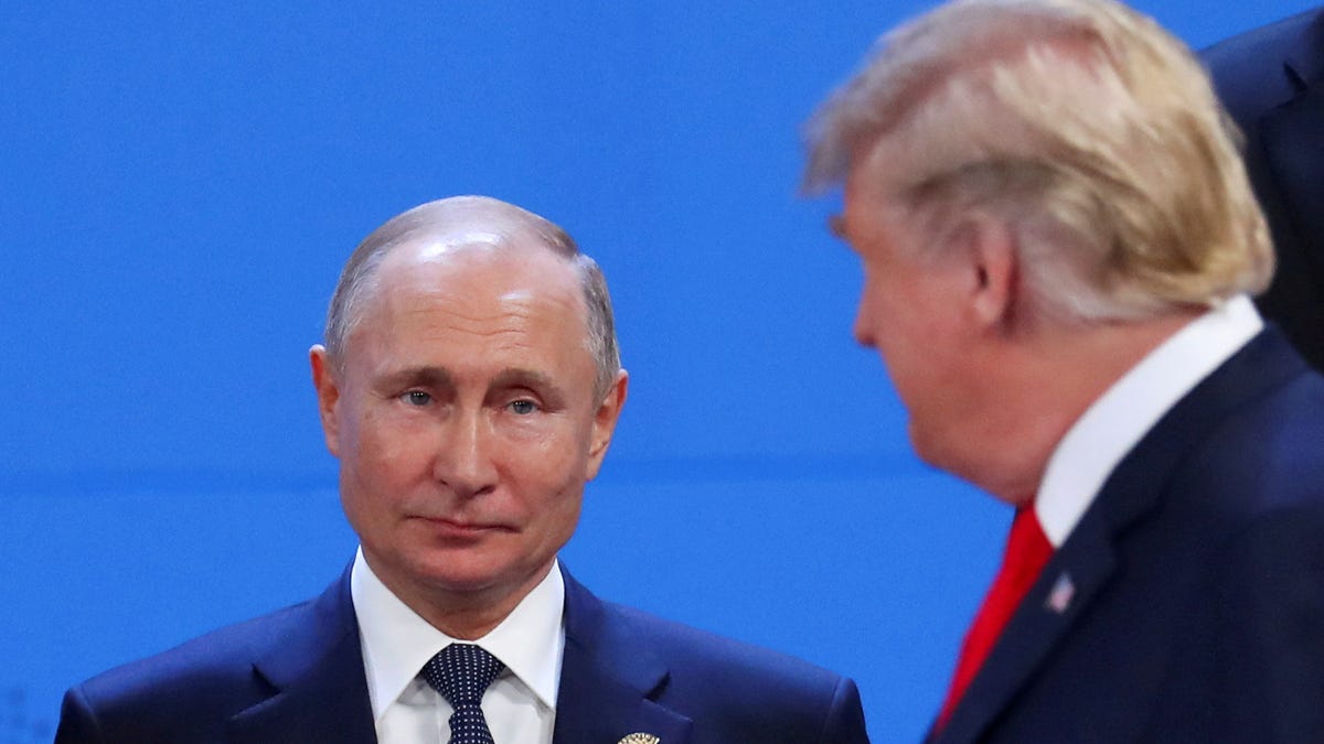 President Donald Trump, right, and Russia's President Vladimir Putin are seen during the G20 leaders summit in Buenos Aires, Argentina, on Nov. 30, 2018.