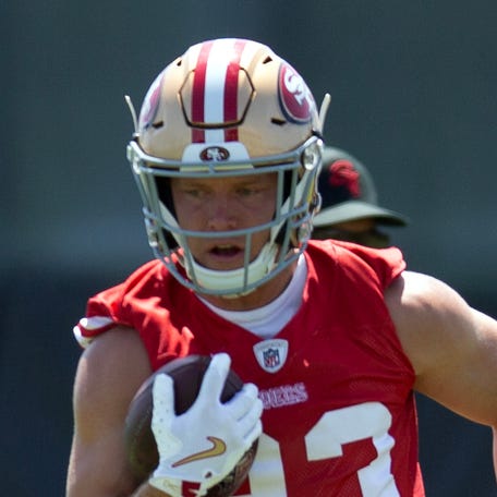 San Francisco 49ers running back Christian McCaffrey runs a play from scrimmage during a team OTA at Levi's Stadium.
