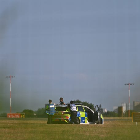 SOUTHEND, ENGLAND - JULY 13: Emergency services attend the scene of a plane crash at Southend Airport on July 13, 2025 in Southend, England. A Beechcraft B200 passenger plane has crashed shortly after take off from London Southend Airport. The aircraft, which was scheduled to fly to Lelystad in the Netherlands, was reportedly seen engulfed in flames and smoke after it crashed around 4pm on Sunday. (Photo by Getty Images)