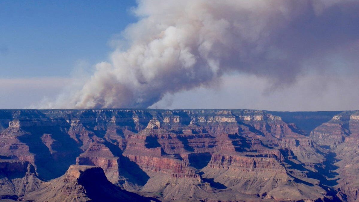 Smoke billows over the Grand Canyon, Arizona in this image released on July 11, 2025, obtained from social media.