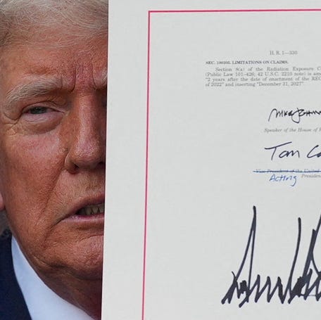 U.S. President Donald Trump presents the sweeping spending and tax legislation, known as the "One Big Beautiful Bill Act," after he signed it, at the White House in Washington, D.C., U.S., July 4, 2025. REUTERS/Leah Millis  TPX IMAGES OF THE DAY