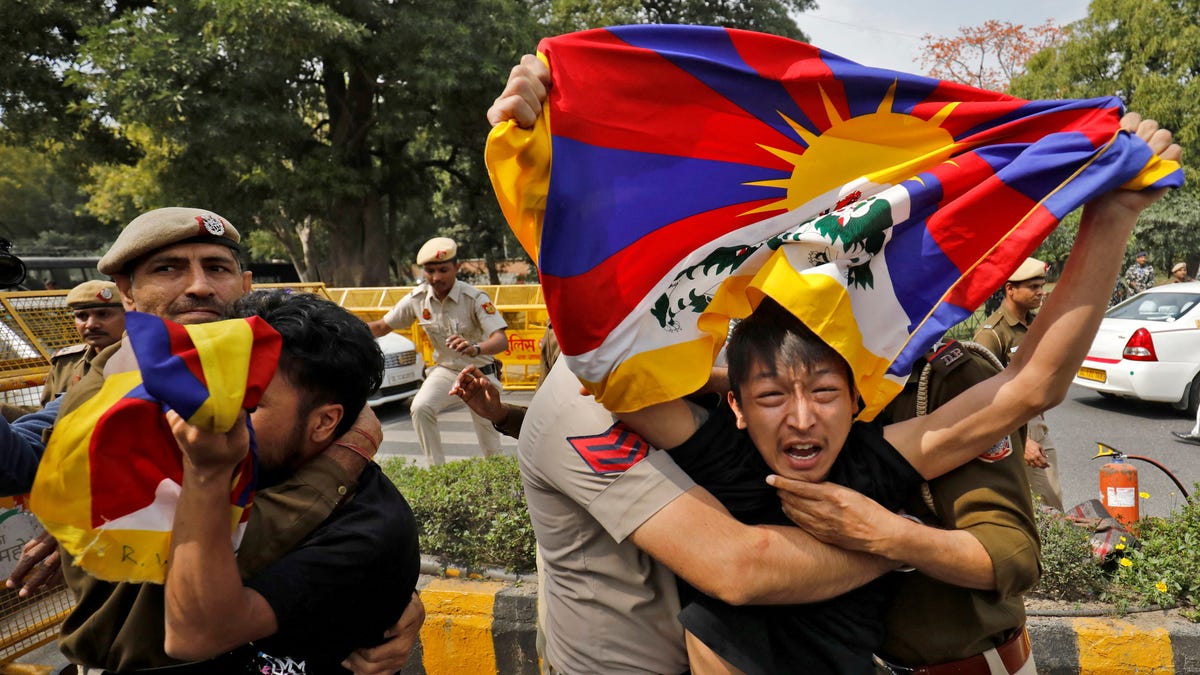 Police detain Tibetan exiles during a protest against the visit of Chinese Foreign Minister Qin Gang, who was scheduled to participate in a G20 foreign ministers' meeting, near the Chinese embassy in New Delhi, India, March 1, 2023. The 14th Dalai Lama, the spiritual leader of Tibetan Buddhism, has been living in India since fleeing there in 1959 after a failed uprising against Chinese rule in Tibet.