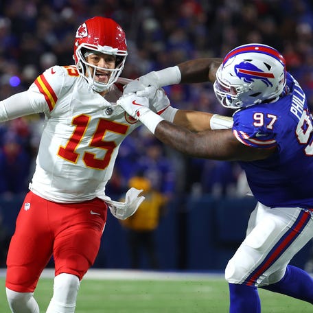 Jordan Phillips #97 of the Buffalo Bills attempts to sack Patrick Mahomes #15 of the Kansas City Chiefs during the fourth quarter at Highmark Stadium on November 17, 2024 in Orchard Park, New York.