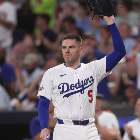 Jul 15, 2025; Cumberland, Georgia, USA; National League first baseman Freddie Freeman (5) of the Los Angeles Dodgers reacts in the third inning during the 2025 MLB All Star Game at Truist Park. Mandatory Credit: Brett Davis-Imagn Images