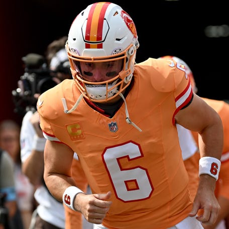 Tampa Bay Buccaneers quarterback Baker Mayfield (6) jogs on to the field before the start of the game against the Atlanta Falcons at Raymond James Stadium.