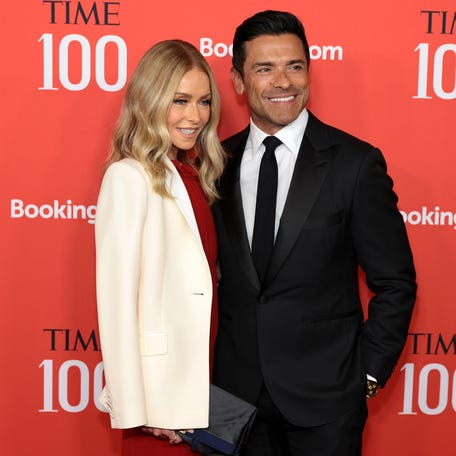 Kelly Ripa, left, and Mark Consuelos attend the 2024 Time100 Gala at Jazz at Lincoln Center on April 25, 2024, in New York City.