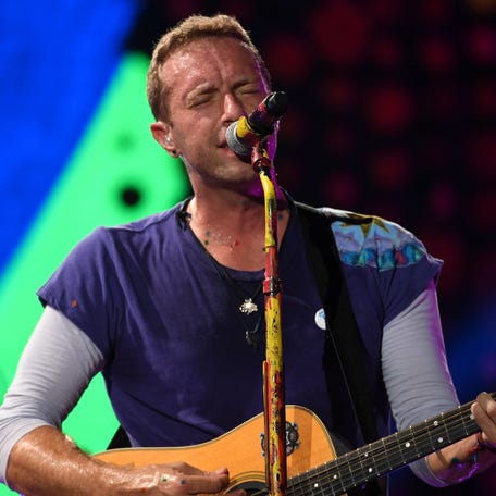 Aug 28, 2017; Miami Gardens, FL, USA; Chris Martin of Coldplay performs at the Hard Rock Stadium. Mandatory Credit: Ron Elkman/USA TODAY NETWORK