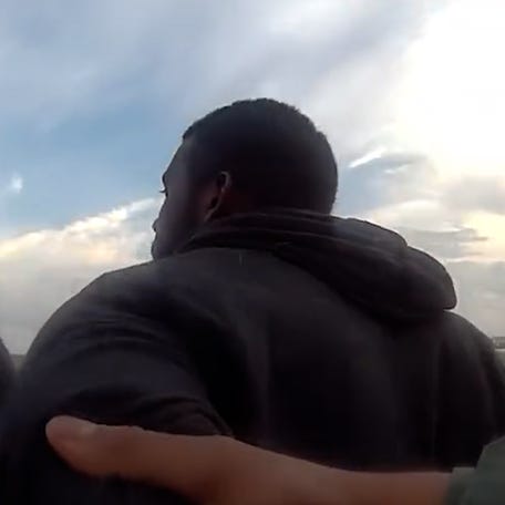 Newly-released bodycam footage shows a suspect being arrested after he allegedly cut the fence and entered the air operations area at Atlanta airport.