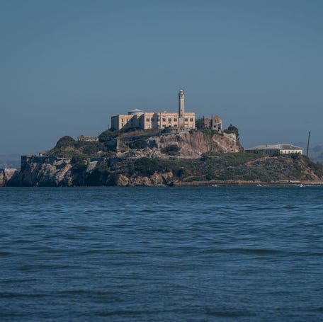 SAN FRANCISCO, CALIFORNIA - AUGUST 16: A general view of Alcatraz Island on August 16, 2024 near San Francisco, California. Humpback whales have been spotted in large numbers along the San Francisco Bay Area coast recently as they travel their migratory route. (Photo by Loren Elliott/Getty Images)