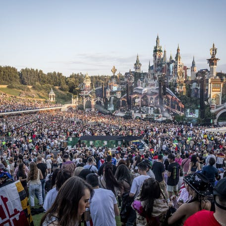 Visitors attend the first day of the Tomorrowland electronic music festival in Boom on July 21, 2023.