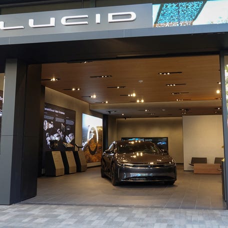 A Lucid electric vehicle is shown inside one of the company's retail stores at a shopping mall in San Diego, California, U.S.,October 20, 2023.